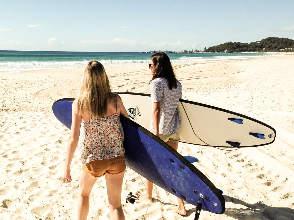 Learn to surf on a soft surfboard on the Gold Coast